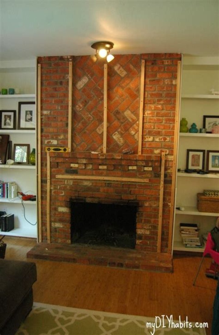 Can you cover brick fireplace with drywall?