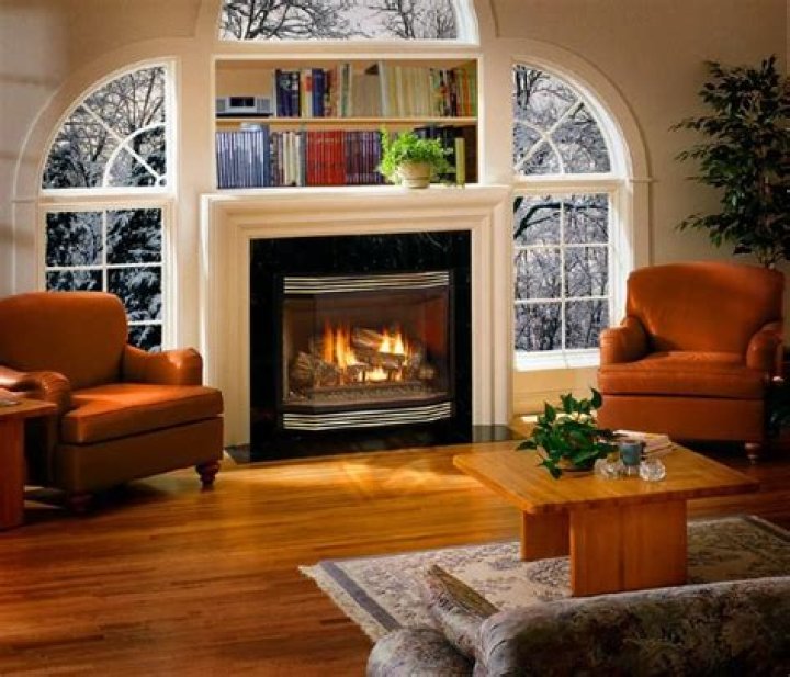Can you put a gas fireplace under a window?