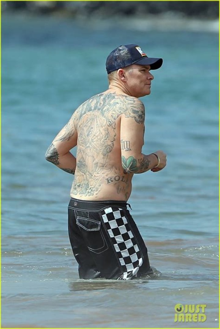 Christian Audigier: Wife, net worth, tattoos, smoking & body facts