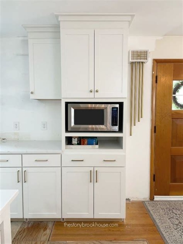 How big is a microwave cabinet?