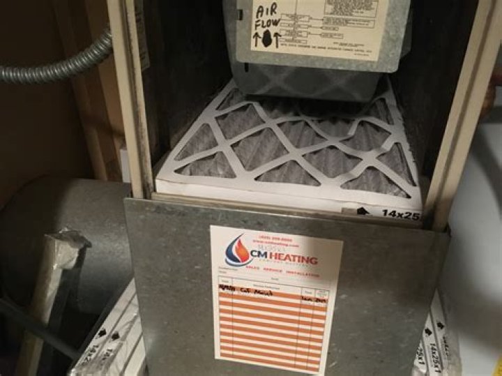How do I change the filter in my Heil furnace?