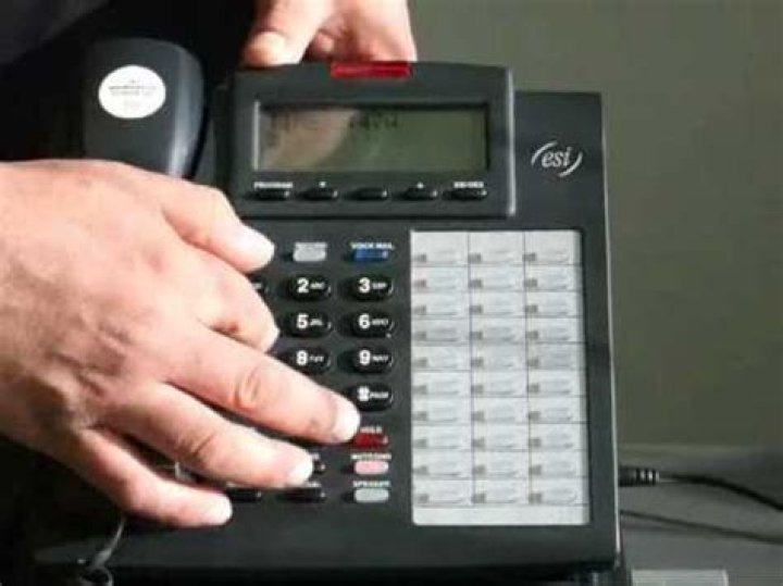 How do I change the time on my ESI phone?