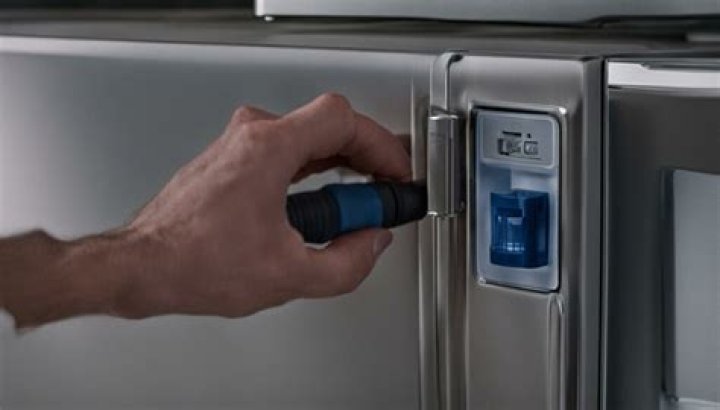 How do I clean my ice dispenser on my Samsung refrigerator?