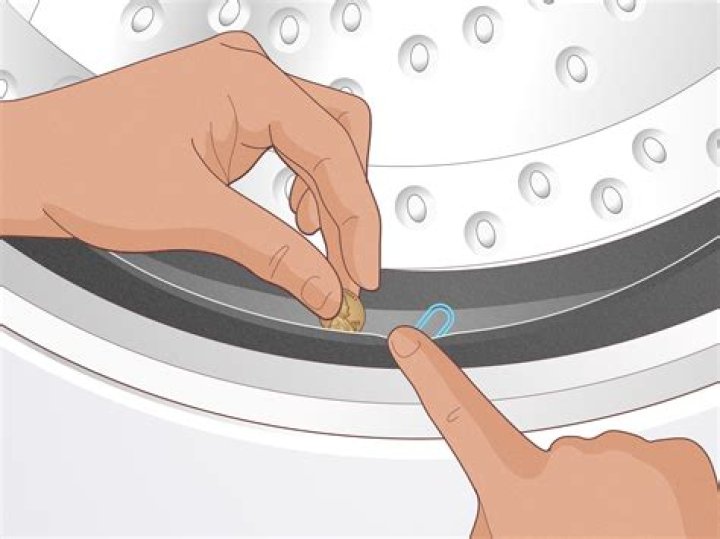 How do I clean the rubber seal on my LG washing machine?