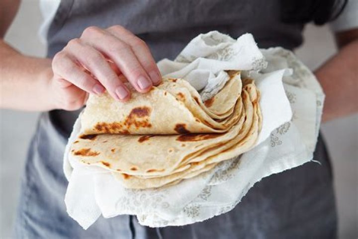 How do I keep flour tortillas warm?