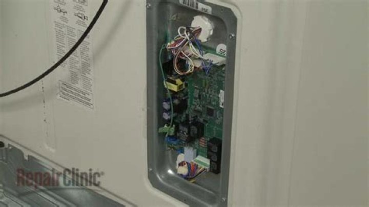 How do I reset my GE refrigerator control panel?