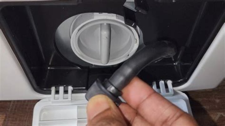How do I unclog my Samsung washing machine drain?