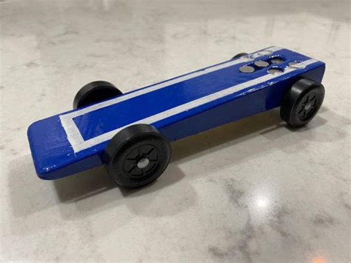 How do you align Pinewood Derby wheels?