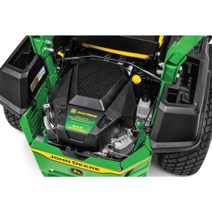 How do you change the battery in a John Deere Zero Turn mower?