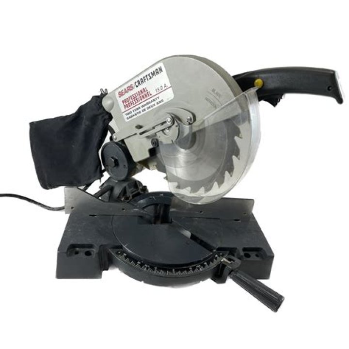 How do you change the blade on a Craftsman 10 inch compound miter saw?