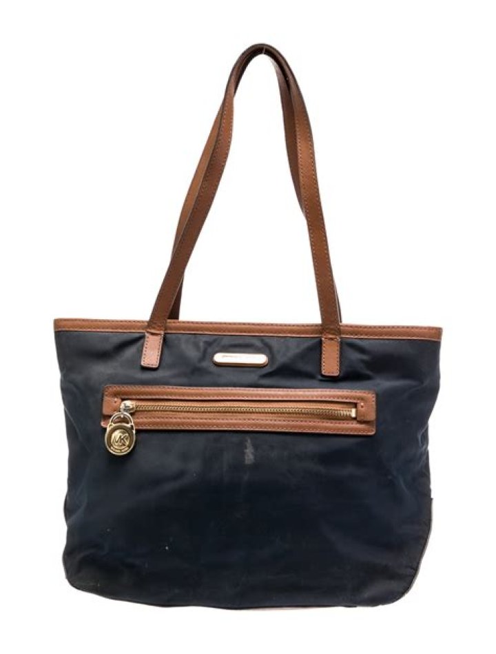 How do you clean a Michael Kors nylon bag?