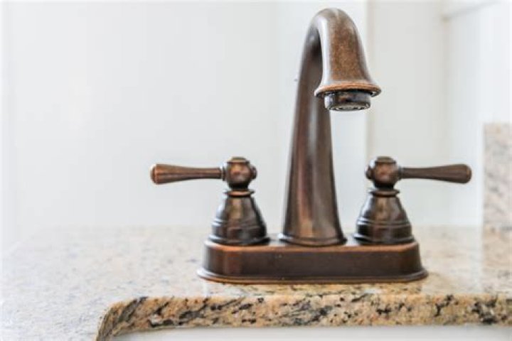 How do you clean a Moen Oil rubbed bronze faucet?