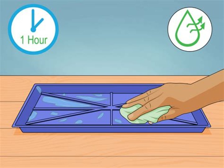 How do you clean a non removable drip pan?