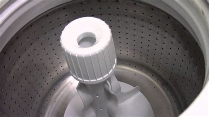 How do you clean a Speed Queen washing machine?