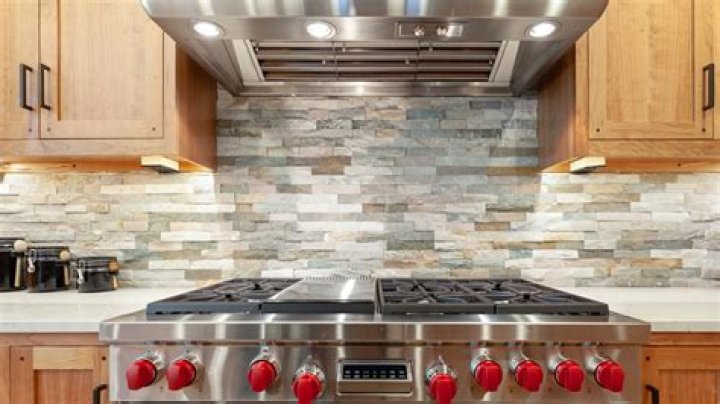 How do you clean natural stone backsplash?