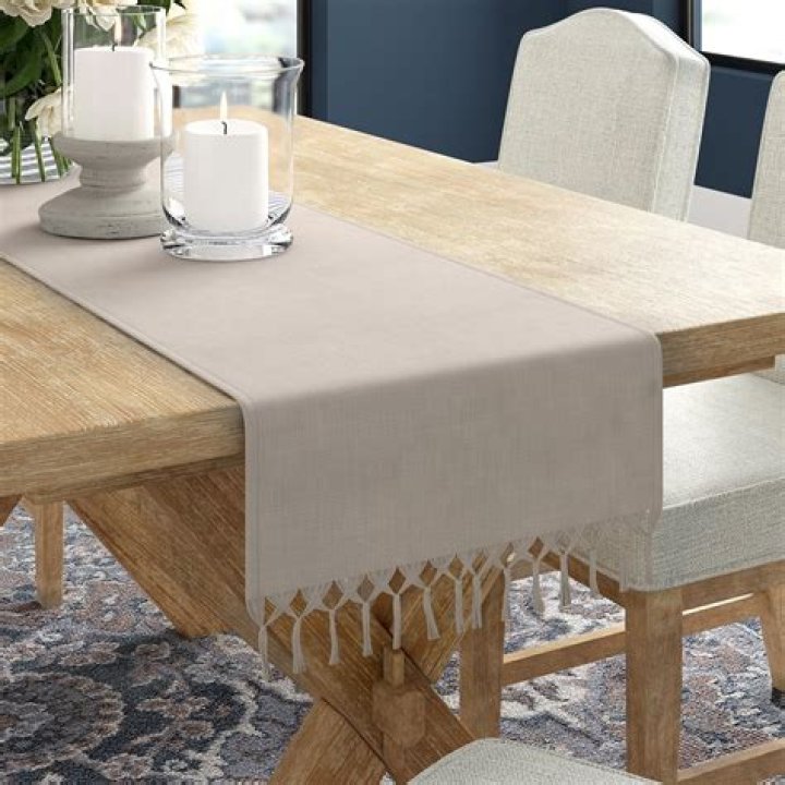 How do you decorate a table with a runner?