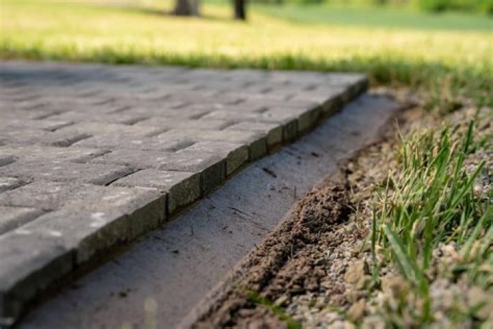 How do you edge a driveway with railroad ties?