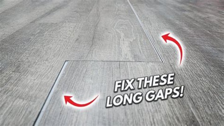 How do you fill gaps between vinyl tiles?