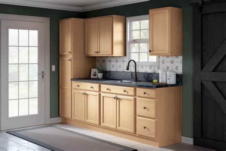 How do you finish unfinished oak kitchen cabinets?