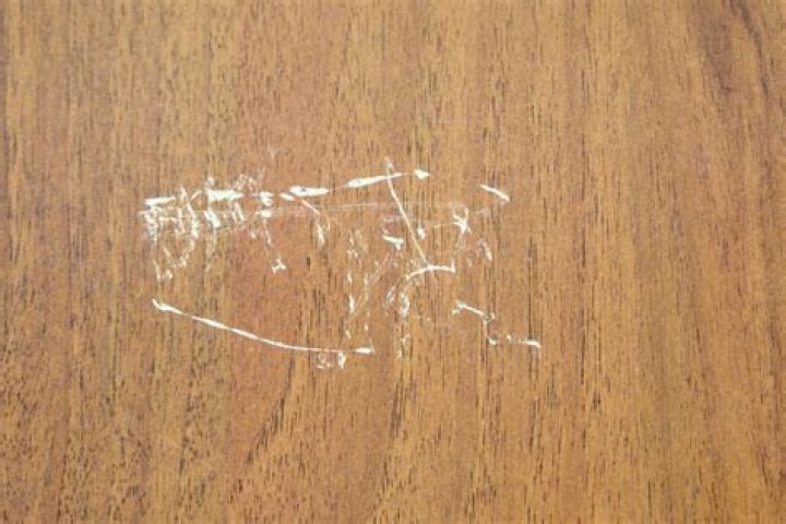 How do you fix scratches on a laminate table?