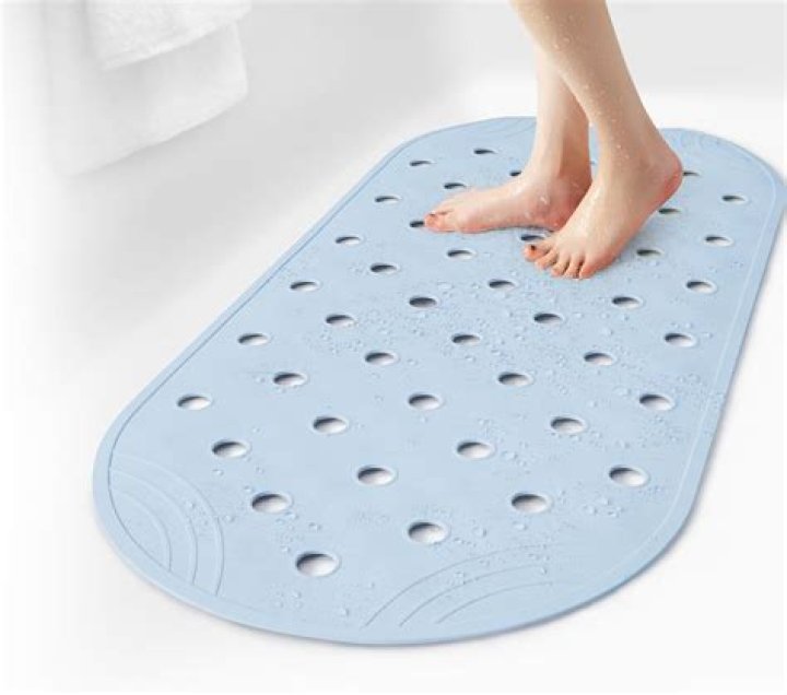How do you get the rubber smell out of a bath mat?