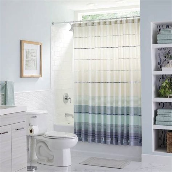 How do you hang a shower curtain on a slanted ceiling?