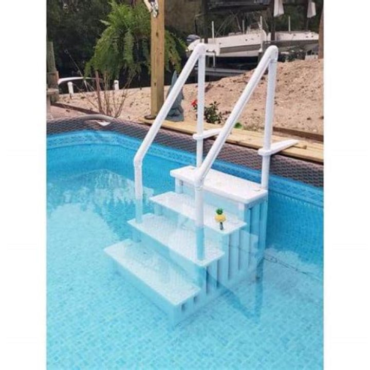 How do you hold down a pool ladder?