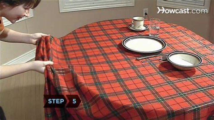 How do you keep tablecloth from sliding?