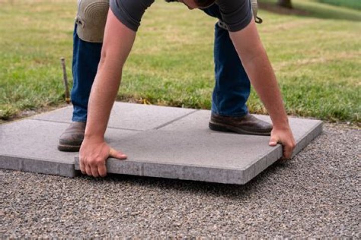 How do you lay a concrete slab on a lawn?