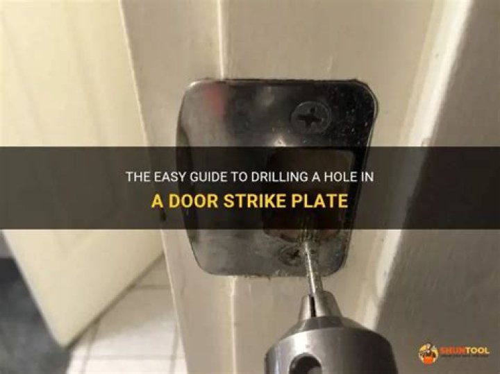 How do you make a strike plate hole?
