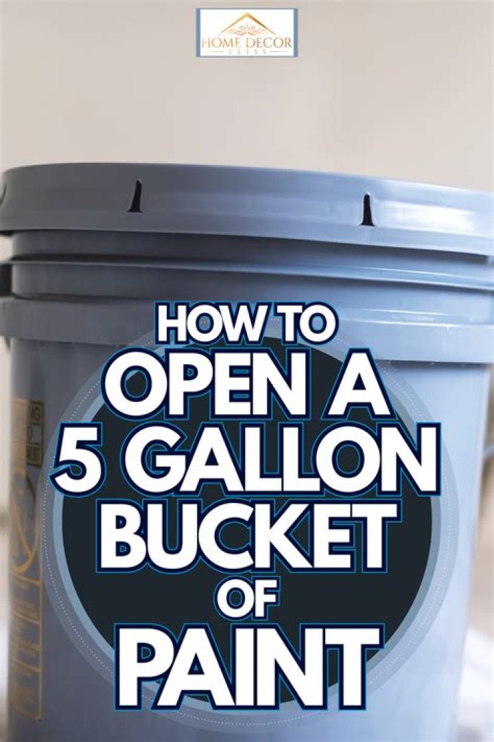 How do you open a 5 gallon Behr paint bucket?