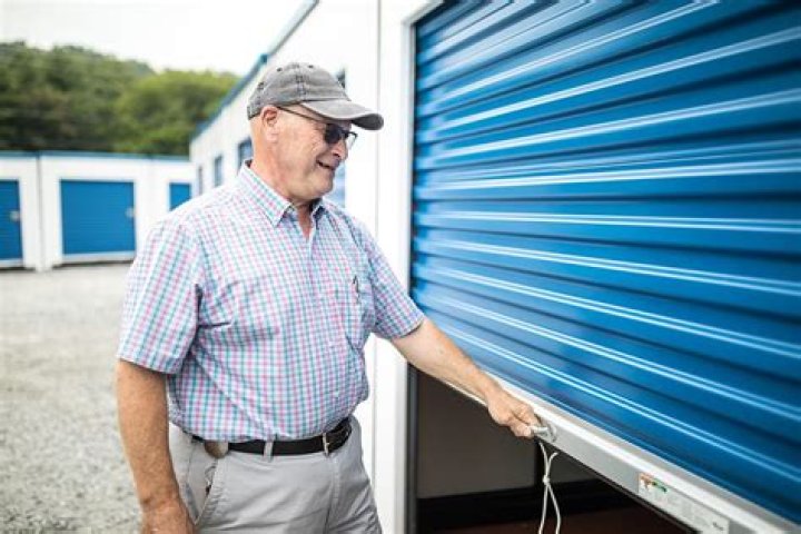 How do you open a stuck storage unit door?
