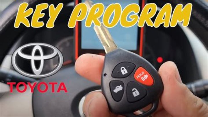 How do you program a 2009 Toyota Corolla remote?