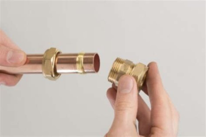 How do you remove compression fittings from brass?