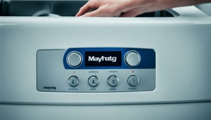 How do you reset a Maytag Centennial washing machine?