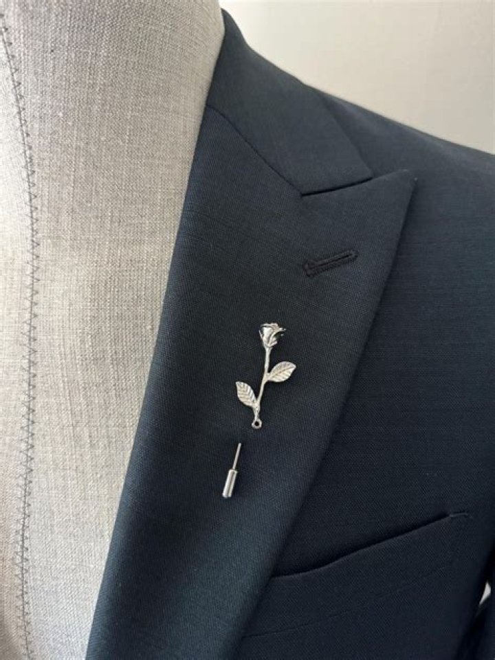 How do you wear a lapel flower?