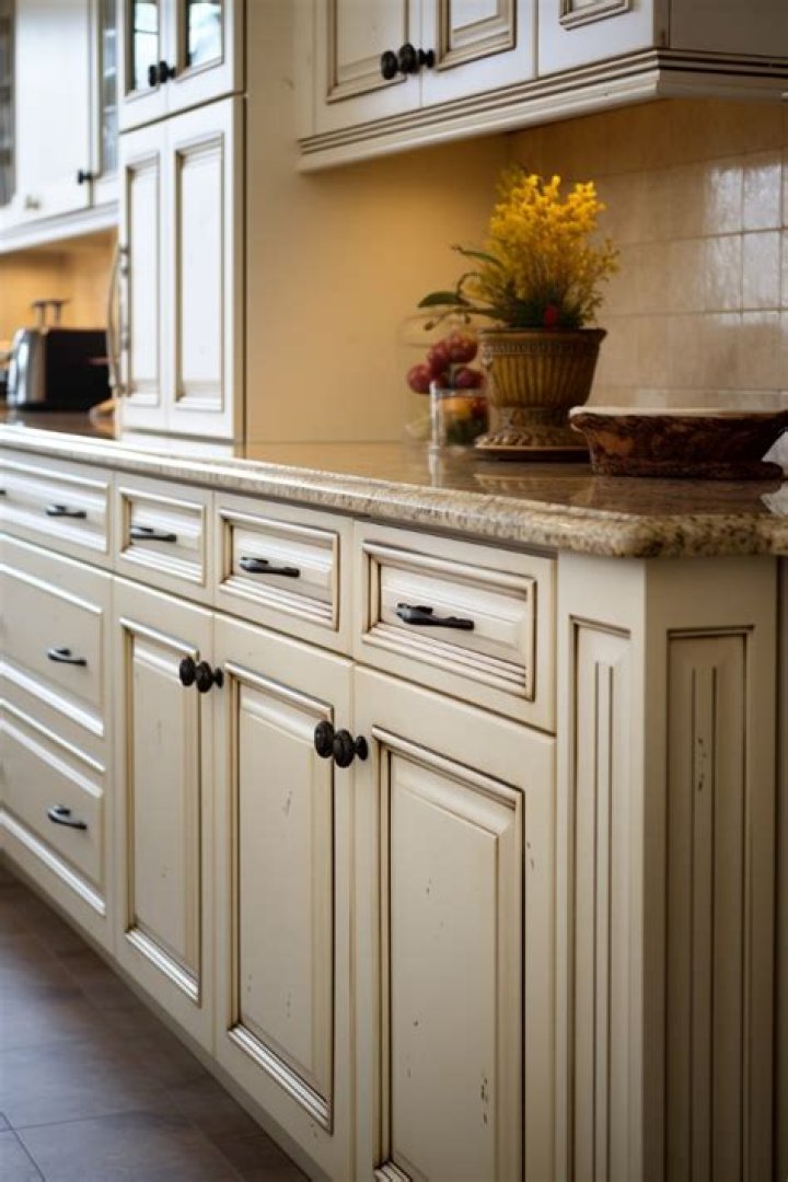 How do you whiten yellowed laminate cabinets?