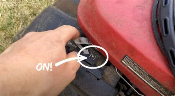 How does an automatic choke work on a lawn mower?