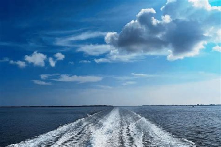 How long is the ferry ride from Belize City to Ambergris Caye?