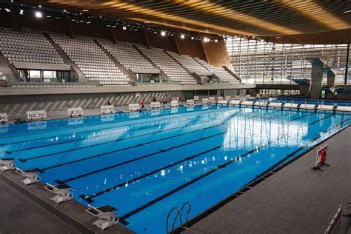 How many laps is a mile in an Olympic size pool?