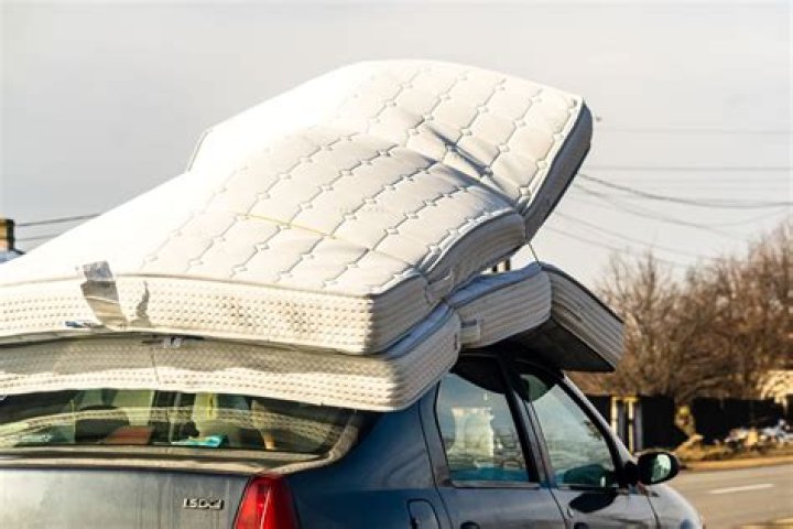 Is it legal to tie a mattress to the roof of your car?