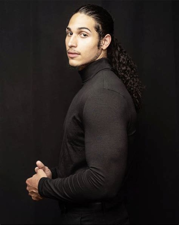 Is Roman Reigns a twin?