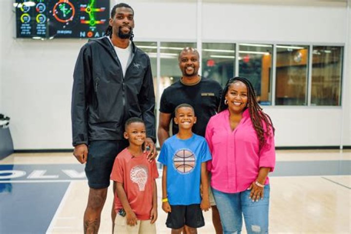 Eric Reid Sr. (father), and Sharon Reid (mother)