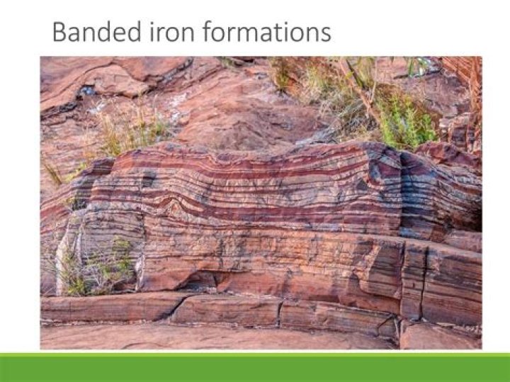 What are banded iron formations and what do they indicate?