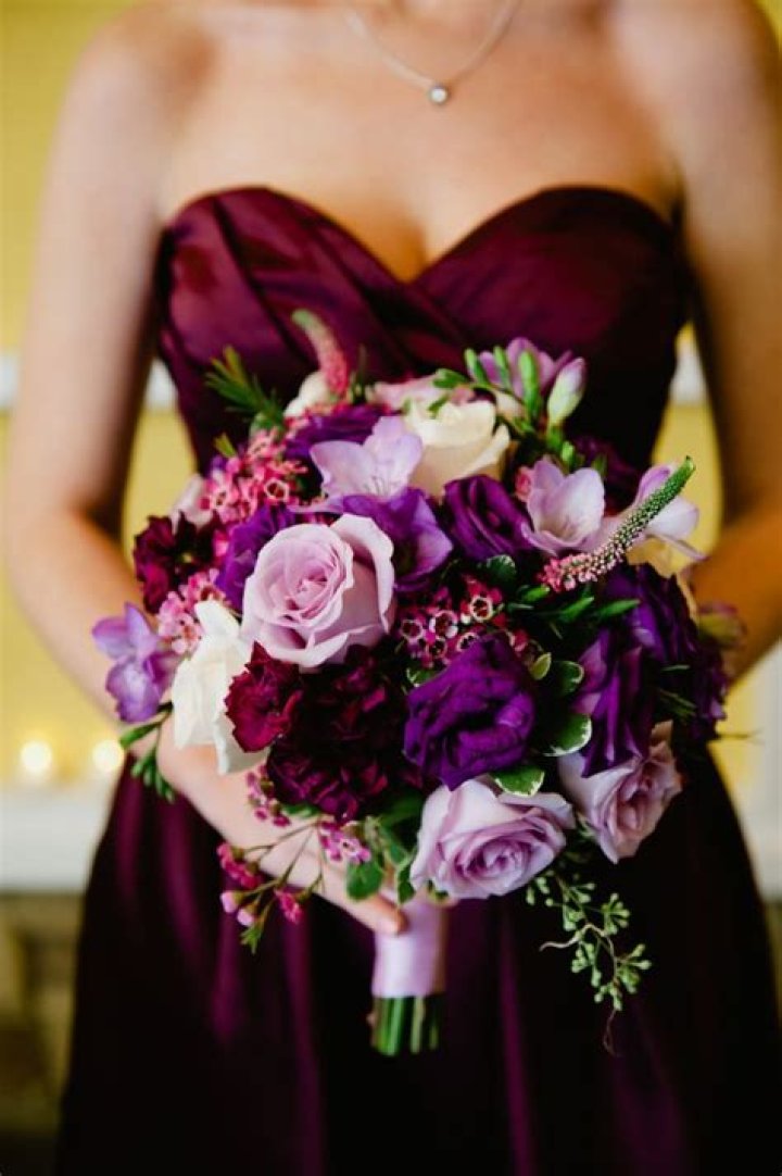 What color flowers go with purple?