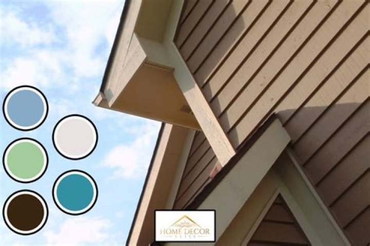 What color goes with almond siding?