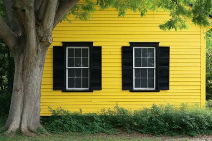 What color shutters look best on a yellow house?