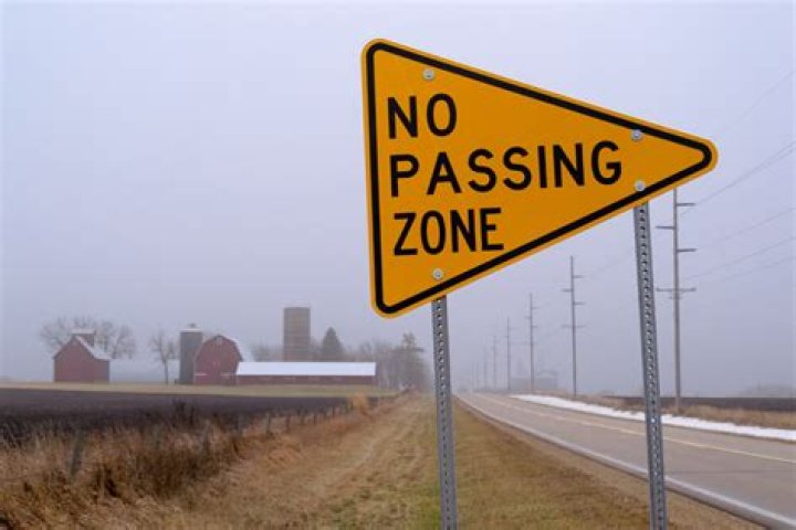 What does a no passing sign look like?