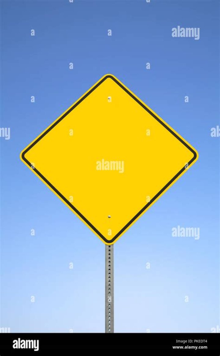 What does a yellow sign with a black diamond mean?