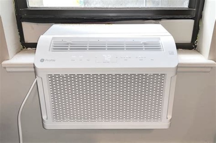 What does the fan mode do on a window air conditioner?